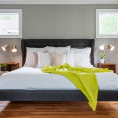 Gray Midcentury Master Bedroom With Green Throw