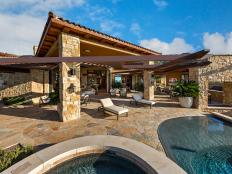 Wide Angle View of Contemporary Flagstone Patio and Infinity Pool