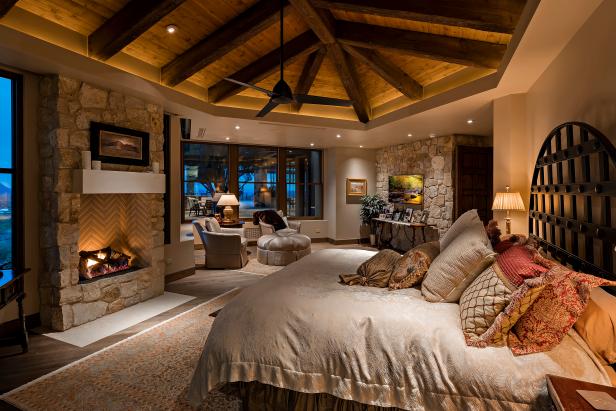 Cozy Master Bedroom With Fireplace And Exposed Beam Ceiling Hgtv