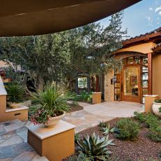 Flagstone Pathway Leads to Home's Entry