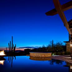 Infinity Pool Reflects Arizona Sunset