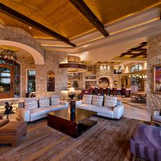 Open, Contemporary Living Room With Stone Walls