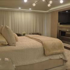 White Master Bedroom With Fireplace