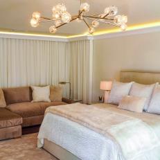 Neutral Master Bedroom With Velvet Sectional