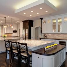 Neutral Transitional Chef Kitchen With Two Islands