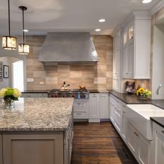 Neutral Transitional Kitchen With Zinc Hood