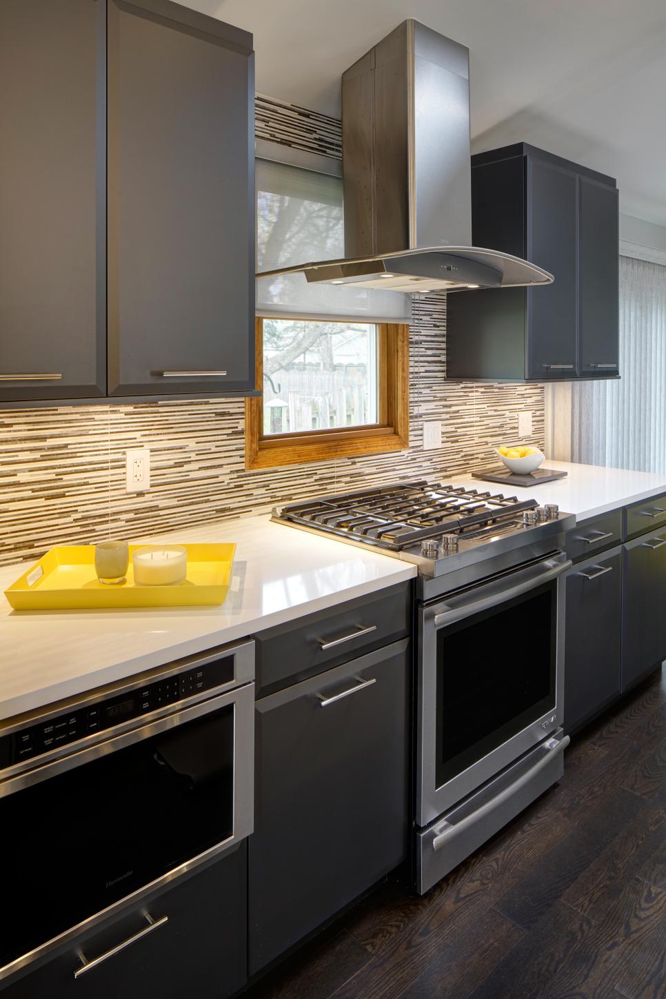 Gray and Black Modern Kitchen With Yellow Tray   HGTV