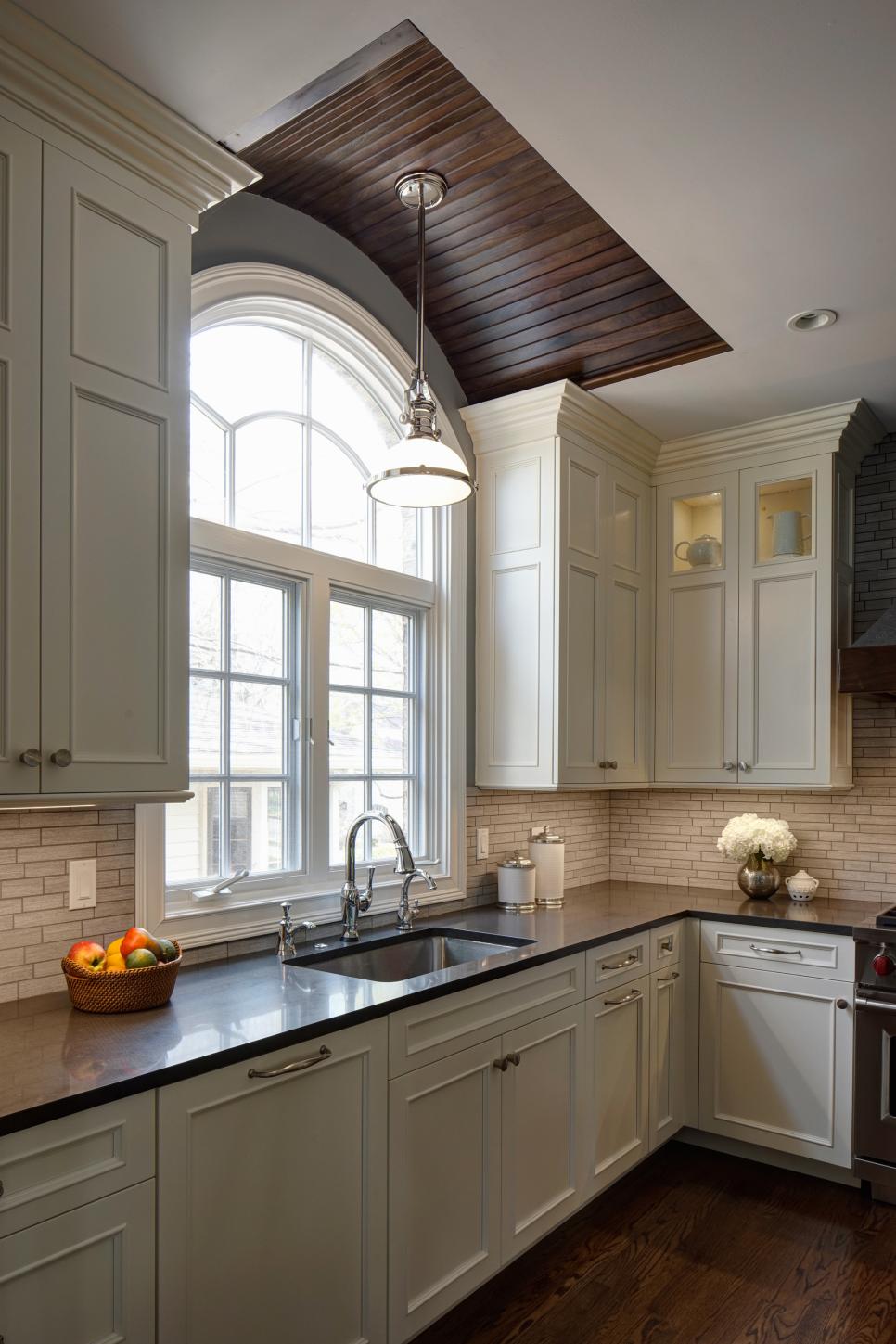 Arched Kitchen Window and Walnut Beadboard | HGTV