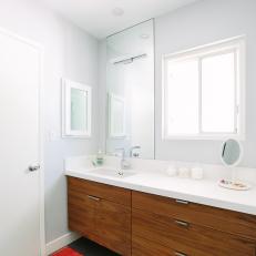 White Bathroom With Colorful Rug