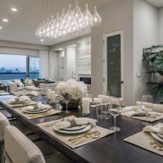 Contemporary, White Dining Room With Chic Chandelier