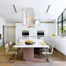 White Modern Dining Room With Glass Fixture