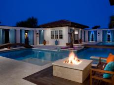 Mediterranean Outdoor Living Space With Pool and Fire Pit