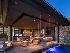Elegant Covered Patio With Rainfall Water Feature