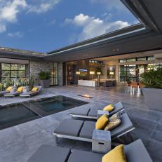 Relaxing Patio With Lap Pool and Lounge Seating