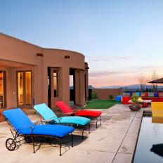 Stylish Outdoor Space With Colorful Lounge Chairs