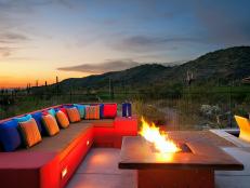 Multicolor Outdoor Sectional, Fire Pit and Arizona Landscape at Sunset