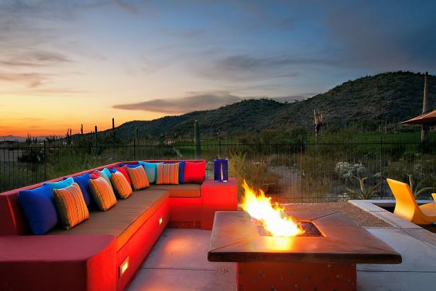 Multicolor Outdoor Sectional, Fire Pit and Arizona Landscape at Sunset