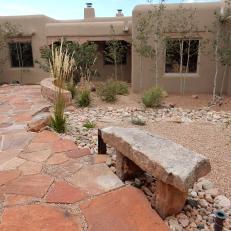 Flagstone Path and Benches in Southwestern Home's Yard