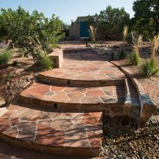 Flagstone Path Leads to Southwestern Home's Entrance 