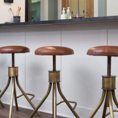 Contemporary Neutral Kitchen with Brown Leather Barstools