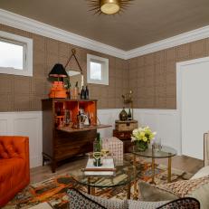 Masculine Living Room With Pops of Orange