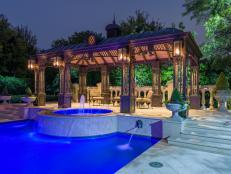 Outdoor Spa and Custom Metal Pavilion at Night