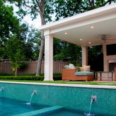 Contemporary Outdoor Space With Mosaic Tile Pool