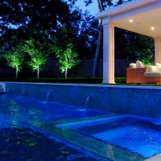 Contemporary Swimming Pool With Soothing Water Wall