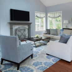 Blue Transitional Family Room With Graphic Rug
