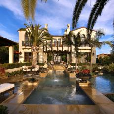 Mediterranean Backyard With Swimming Pool and Palm Trees