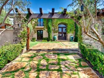 Mediterranean Exterior With Paver Driveway