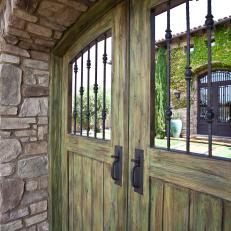 Wooden Gate With Wrought Iron Bars