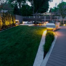 Mod Backyard With Warm Outdoor Lighting