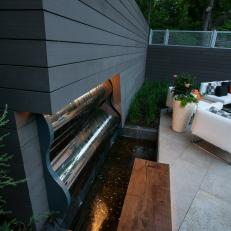 Shiny Water Feature in Modern Backyard