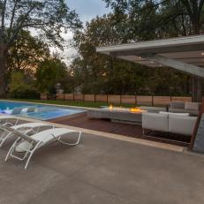 Midcentury Outdoor Seating Area by Pool