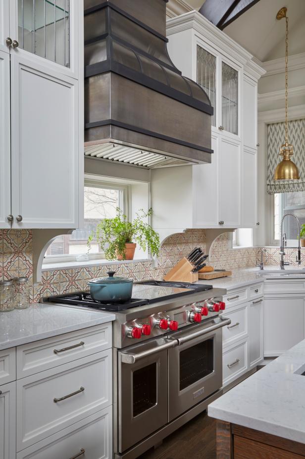 White Transitional Chef Kitchen With Metal Hood | HGTV