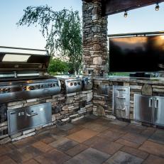 Outdoor Rustic Kitchen With TV