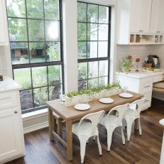 Contemporary White Kitchen with Brown Child's Table 