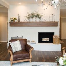 Contemporary Neutral Living Room with Wood Mantel