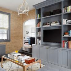Gray Bookshelves Add Storage in Sitting Room