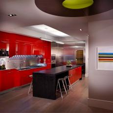 Modern Open Kitchen With Red Cabinets
