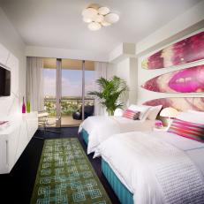 Tropical Bedroom With Pink Surfboards