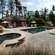 Elegant Swimming Pool and Hot Tub With Cabana, Concrete Tile Patio and Surrounding Foliage