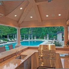 Traditional Outdoor Kitchen With Swimming Pool
