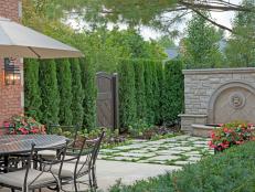 Traditional Outdoor Dining With Water Feature