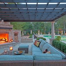 Comfortable Outdoor Living Area With Stone Fireplace
