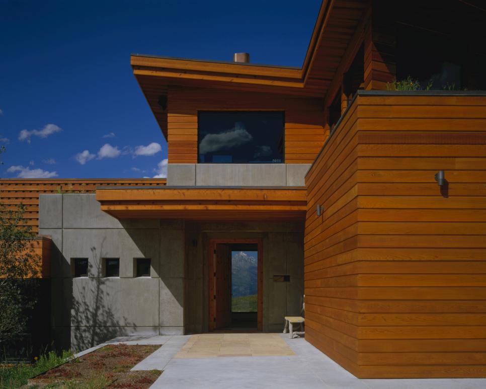 Cedar and Concrete Modern Home Front Entrance With Roof Overhangs and