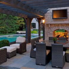 Double-Sided Fireplace Warms Poolhouse