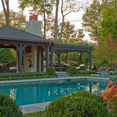 Poolhouse Adds Extra Entertaining and Relaxing Spaces in Home's Backyard