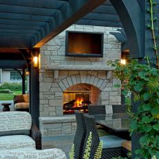 Double-Sided Stone Fireplace in Poolhouse